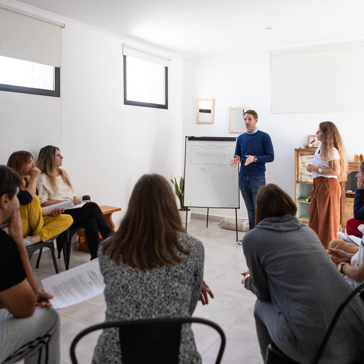 A speaker sharing ideas with a group